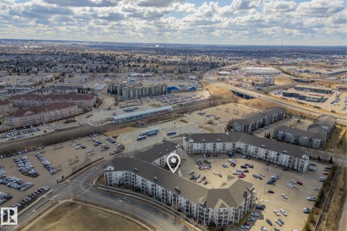 Low-rise apartment complex featuring multiple buildings with private balconies and surface parking - 1306 330 Clareview Station Drive, Edmonton, AB - Outdoor With View