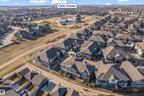 Aerial perspective showcasing the residential community - 41 603 Orchards Boulevard, Edmonton, AB - Outdoor With View