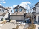 Modern two-story residence with attached garage, featuring horizontal siding and contrasting trim - 3639 15A Street, Edmonton, AB  - Outdoor With Facade 