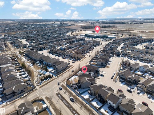 Aerial perspective showcasing a residential neighborhood with varied housing styles - 3639 15A Street, Edmonton, AB - Outdoor With View