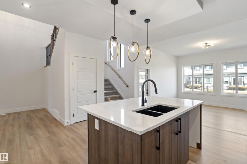 203 Basin Court, Leduc, AB - Indoor Photo Showing Kitchen With Double Sink
