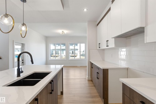 203 Basin Court, Leduc, AB - Indoor Photo Showing Kitchen With Double Sink