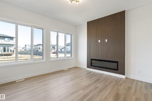 203 Basin Court, Leduc, AB - Indoor With Fireplace