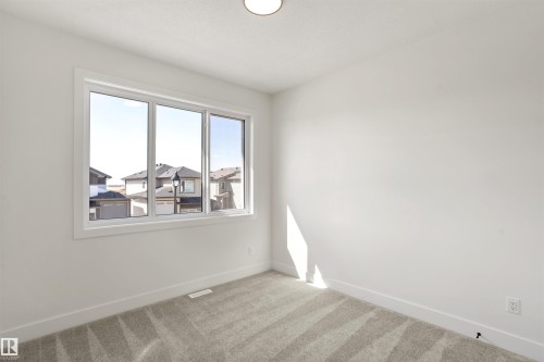 203 Basin Court, Leduc, AB - Indoor Photo Showing Other Room