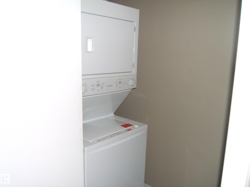 Image quality insufficient for description - 105 11214 80 Street, Edmonton, AB - Indoor Photo Showing Laundry Room