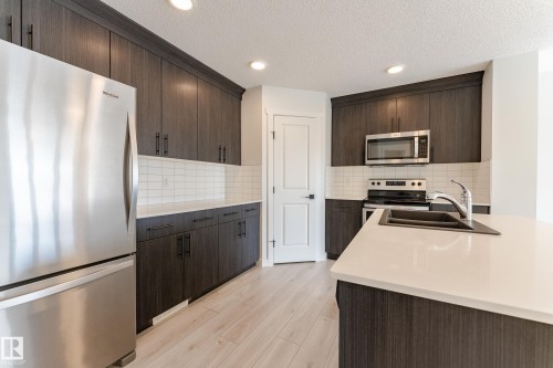 2653 196A, Edmonton, AB - Indoor Photo Showing Kitchen With Double Sink With Upgraded Kitchen