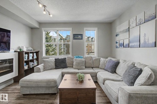 85 2803 James Mowatt Trail, Edmonton, AB - Indoor Photo Showing Living Room