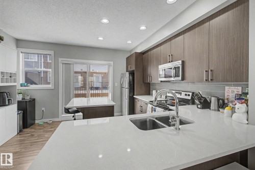 85 2803 James Mowatt Trail, Edmonton, AB - Indoor Photo Showing Kitchen With Stainless Steel Kitchen With Double Sink With Upgraded Kitchen