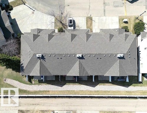 Townhome row with gray shingle roofing - 11 230 Edwards Drive, Edmonton, AB - 