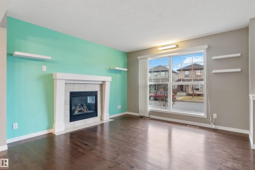 17588 59 Street, Edmonton, AB - Indoor Photo Showing Living Room With Fireplace