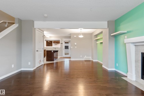 17588 59 Street, Edmonton, AB - Indoor Photo Showing Living Room With Fireplace
