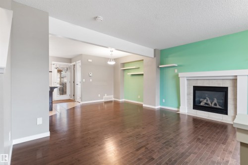 17588 59 Street, Edmonton, AB - Indoor Photo Showing Living Room With Fireplace
