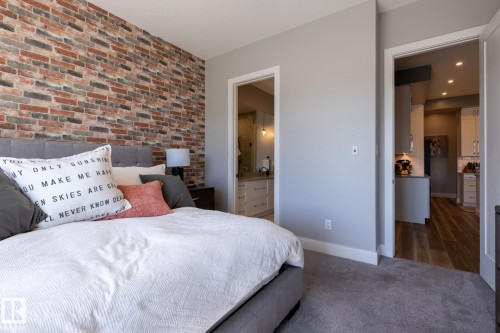 Image quality insufficient for description - 108 7463 May Common, Edmonton, AB - Indoor Photo Showing Bedroom