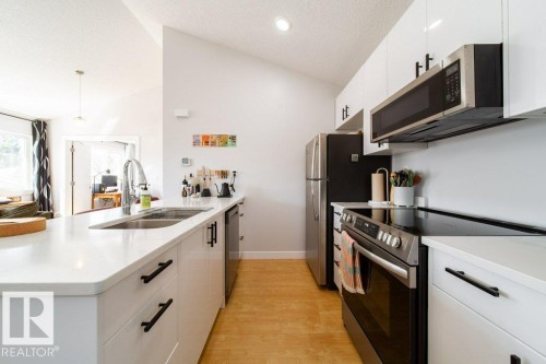8731 85 Avenue, Edmonton, AB - Indoor Photo Showing Kitchen With Double Sink With Upgraded Kitchen