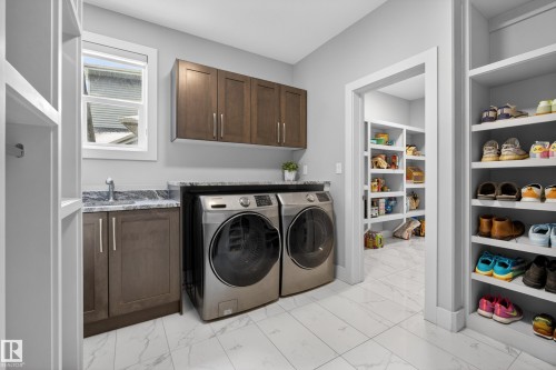 With Laundry. - 1468 Enright Landing, Edmonton, AB - Indoor Photo Showing Laundry Room