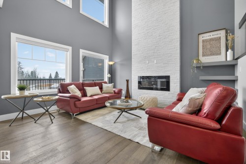 1468 Enright Landing, Edmonton, AB - Indoor Photo Showing Living Room With Fireplace