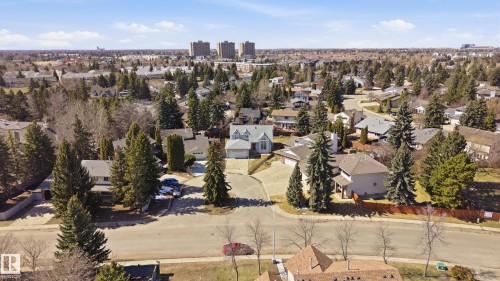 Aerial perspective showcasing a residential neighborhood with numerous mature trees - 394 Walker Road, Edmonton, AB - Outdoor With View