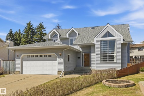 Light gray siding exterior with prominent gable peaks and dormer windows - 394 Walker Road, Edmonton, AB - Outdoor With Facade