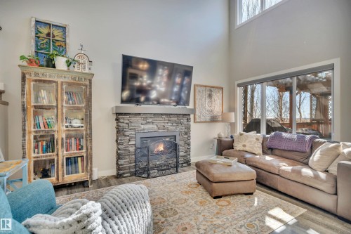 9 Rolston Close, Leduc, AB - Indoor Photo Showing Living Room With Fireplace
