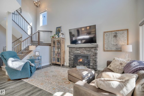 9 Rolston Close, Leduc, AB - Indoor Photo Showing Living Room With Fireplace