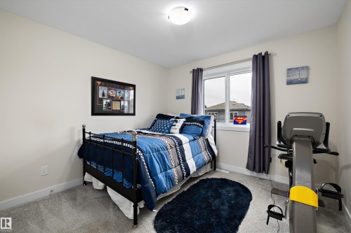 Neutral wall color throughout - 82 Wingate Way, Fort Saskatchewan, AB - Indoor Photo Showing Bedroom