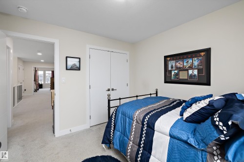 Plush carpet flooring, recessed lighting, and a neutral color palette - 82 Wingate Way, Fort Saskatchewan, AB - Indoor Photo Showing Bedroom