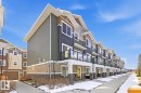 Modern multi-level exterior featuring multiple balconies with glass railings - 61 230 Edgemont Road, Edmonton, AB  - Outdoor With Facade 