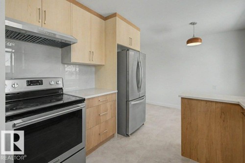 Edmonton, AB - Indoor Photo Showing Kitchen