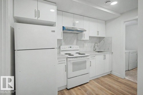 Edmonton, AB - Indoor Photo Showing Kitchen