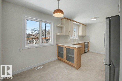 Edmonton, AB - Indoor Photo Showing Kitchen