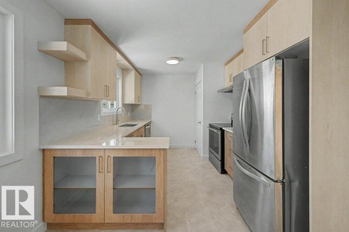 Edmonton, AB - Indoor Photo Showing Kitchen