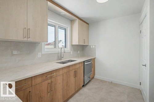 Edmonton, AB - Indoor Photo Showing Kitchen With Double Sink