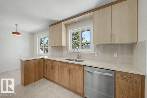 Edmonton, AB - Indoor Photo Showing Kitchen With Double Sink