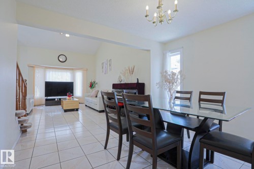 Open-concept living area with neutral color palette - 2433 89 Street, Edmonton, AB - Indoor Photo Showing Dining Room