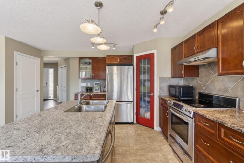 9144 207 Street, Edmonton, AB - Indoor Photo Showing Kitchen With Stainless Steel Kitchen With Double Sink