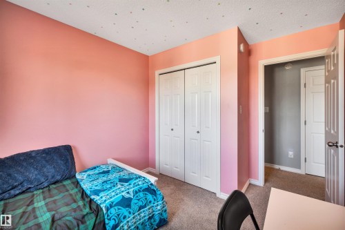 Room featuring plush carpet flooring and a neutral-toned ceiling - 2424 Wonnacott Crest, Edmonton, AB - Indoor Photo Showing Bedroom
