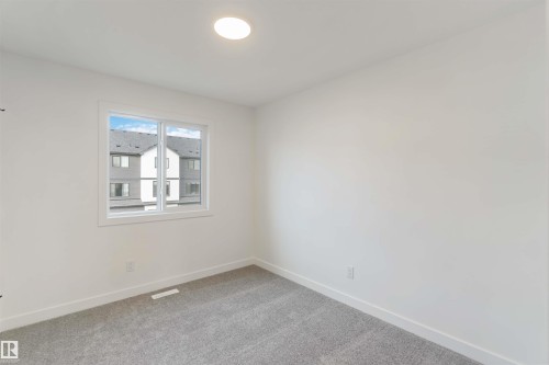 1003 Aster Boulevard, Edmonton, AB - Indoor Photo Showing Other Room