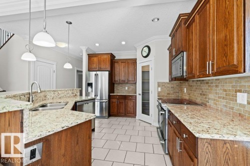 5871 166 Avenue, Edmonton, AB - Indoor Photo Showing Kitchen With Stainless Steel Kitchen With Double Sink With Upgraded Kitchen