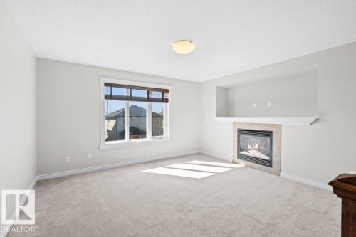 5871 166 Avenue, Edmonton, AB - Indoor Photo Showing Living Room With Fireplace