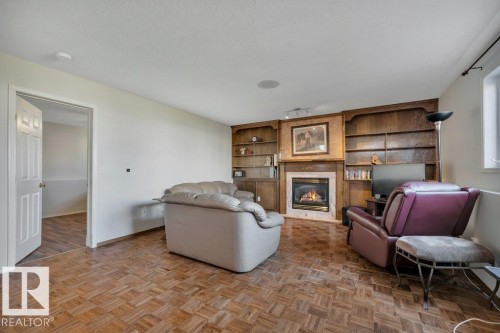 43 Mcleod Crescent, Leduc, AB - Indoor Photo Showing Other Room With Fireplace