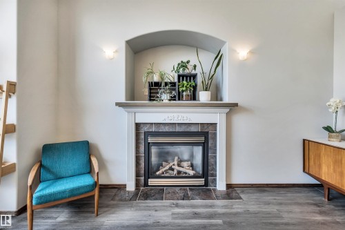 4 Birchmont Drive, Leduc, AB - Indoor Photo Showing Living Room With Fireplace