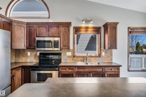 4 Birchmont Drive, Leduc, AB - Indoor Photo Showing Kitchen With Double Sink