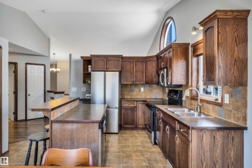 4 Birchmont Drive, Leduc, AB - Indoor Photo Showing Kitchen With Double Sink