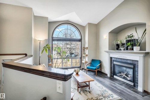 4 Birchmont Drive, Leduc, AB - Indoor Photo Showing Living Room With Fireplace
