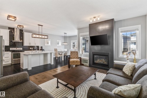 3087 Carpenter Landing, Edmonton, AB - Indoor Photo Showing Living Room With Fireplace