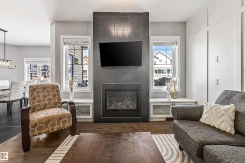 3087 Carpenter Landing, Edmonton, AB - Indoor Photo Showing Living Room With Fireplace