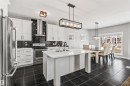 3087 Carpenter Landing, Edmonton, AB  - Indoor Photo Showing Kitchen With Upgraded Kitchen 