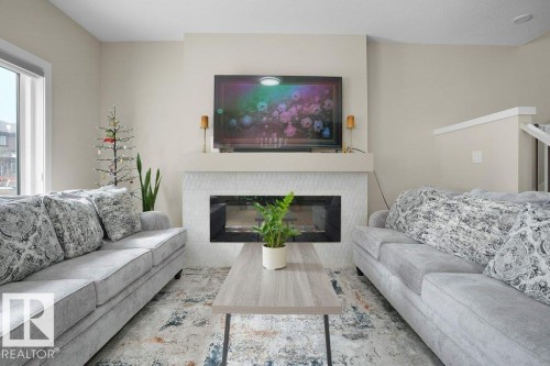1459 Cherniak Way, Edmonton, AB - Indoor Photo Showing Living Room With Fireplace