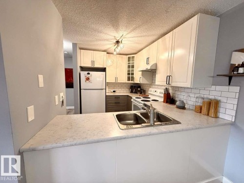 205 60 Alpine Place, St. Albert, AB - Indoor Photo Showing Kitchen With Double Sink