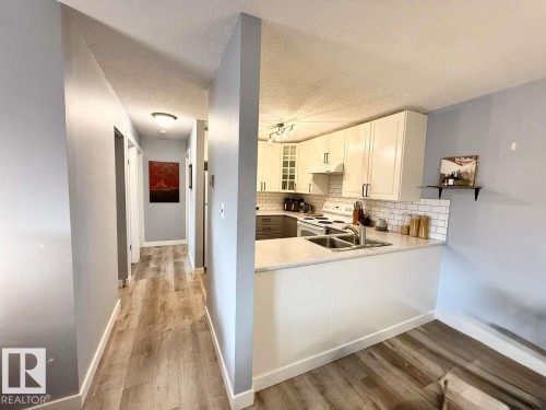 205 60 Alpine Place, St. Albert, AB - Indoor Photo Showing Kitchen With Double Sink